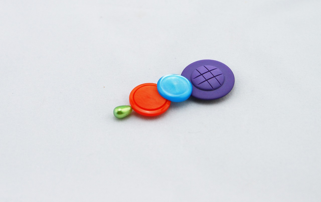 buttons colorful buttons on a hat pin free photo