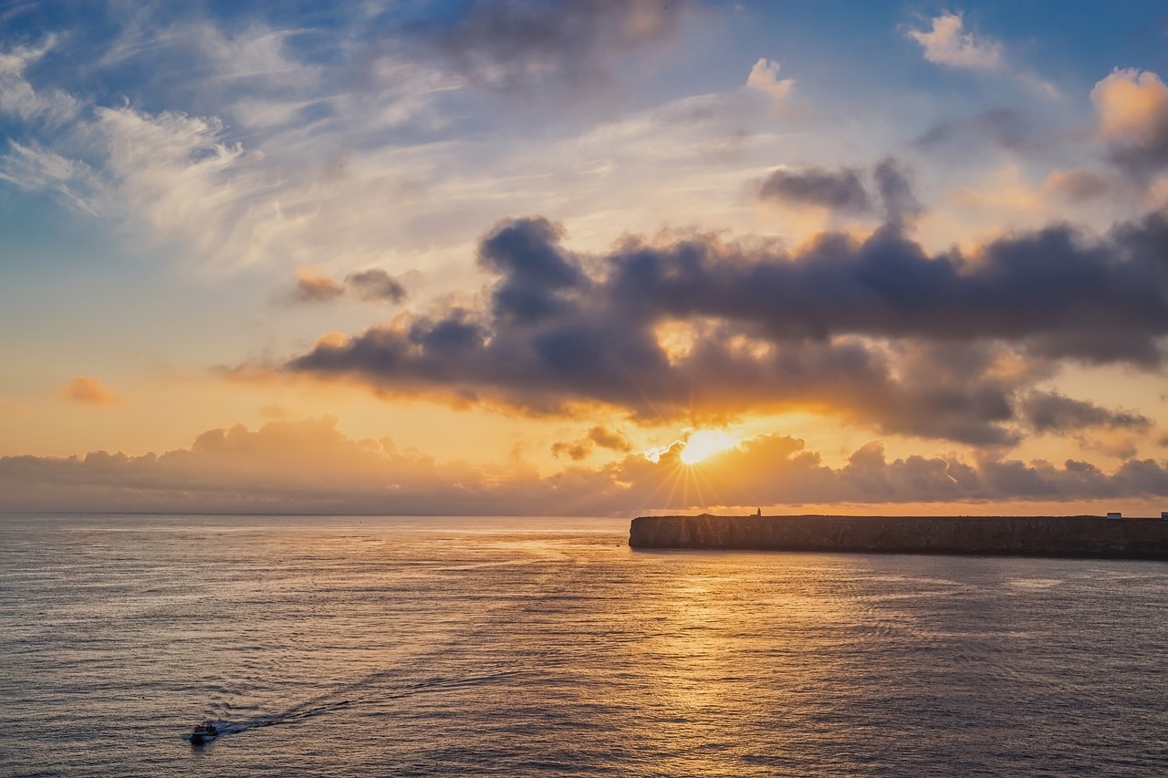 cabo sao vincence  lighthouse  sunset free photo