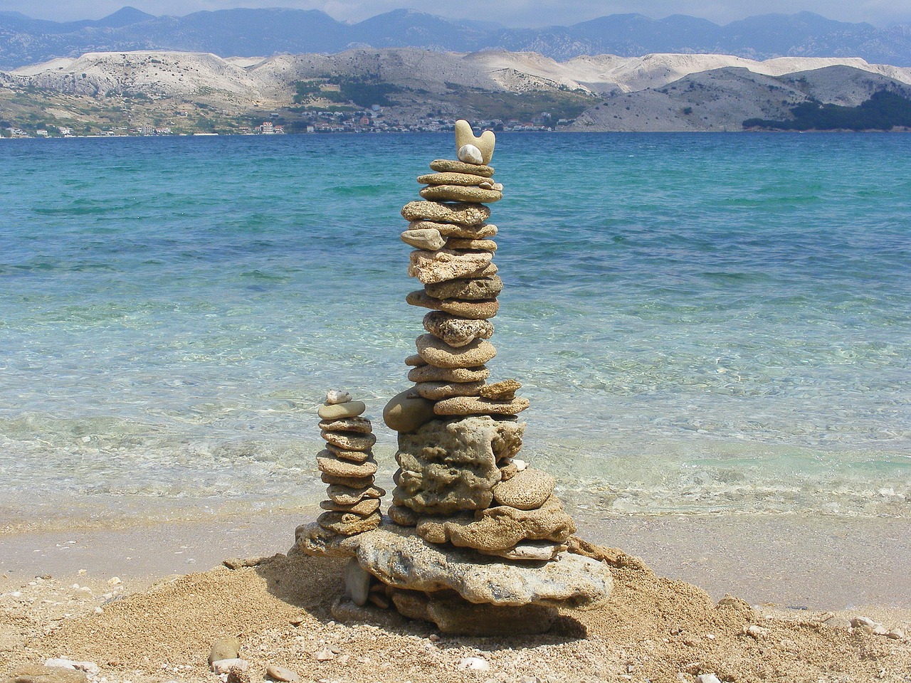 cairn beach stone turrets free photo