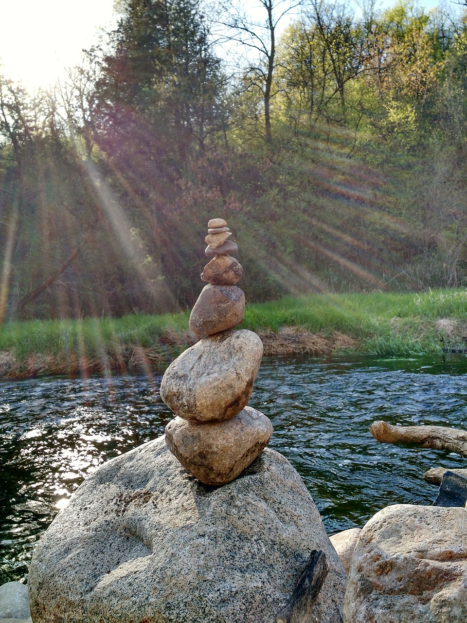 cairn  rocks  stream free photo