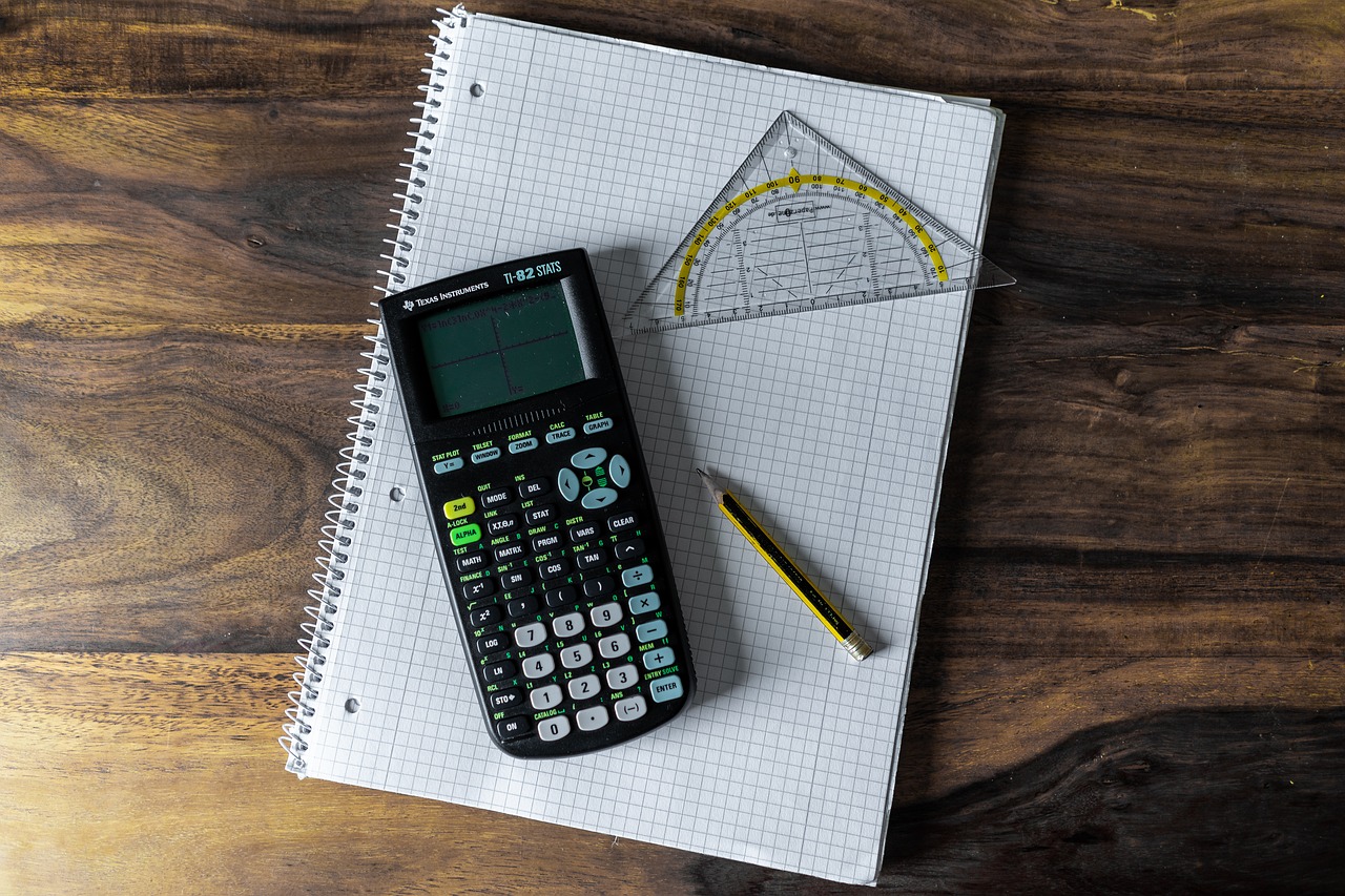 calculator  writing pad  school free photo