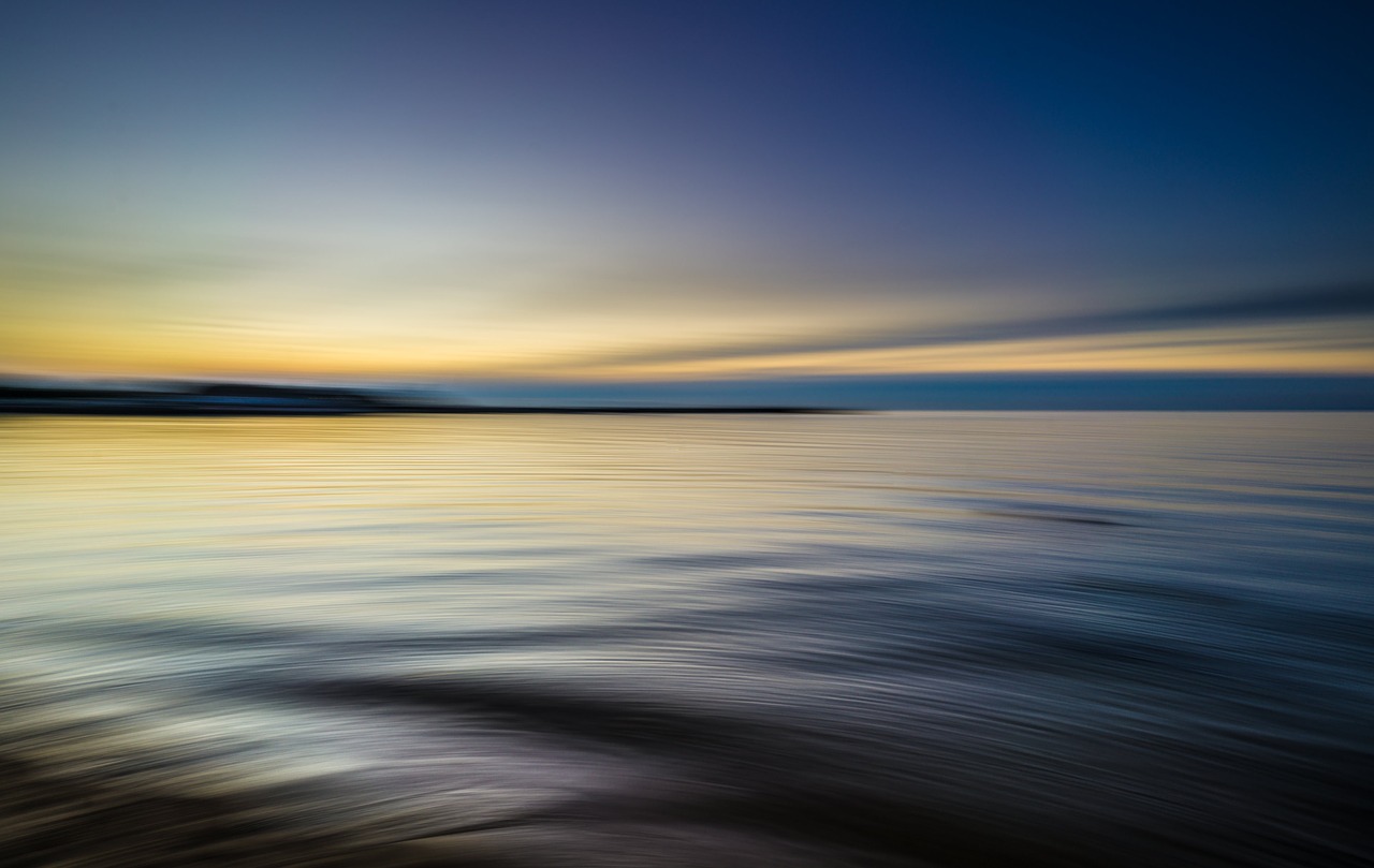 calm waters dawn dusk free photo