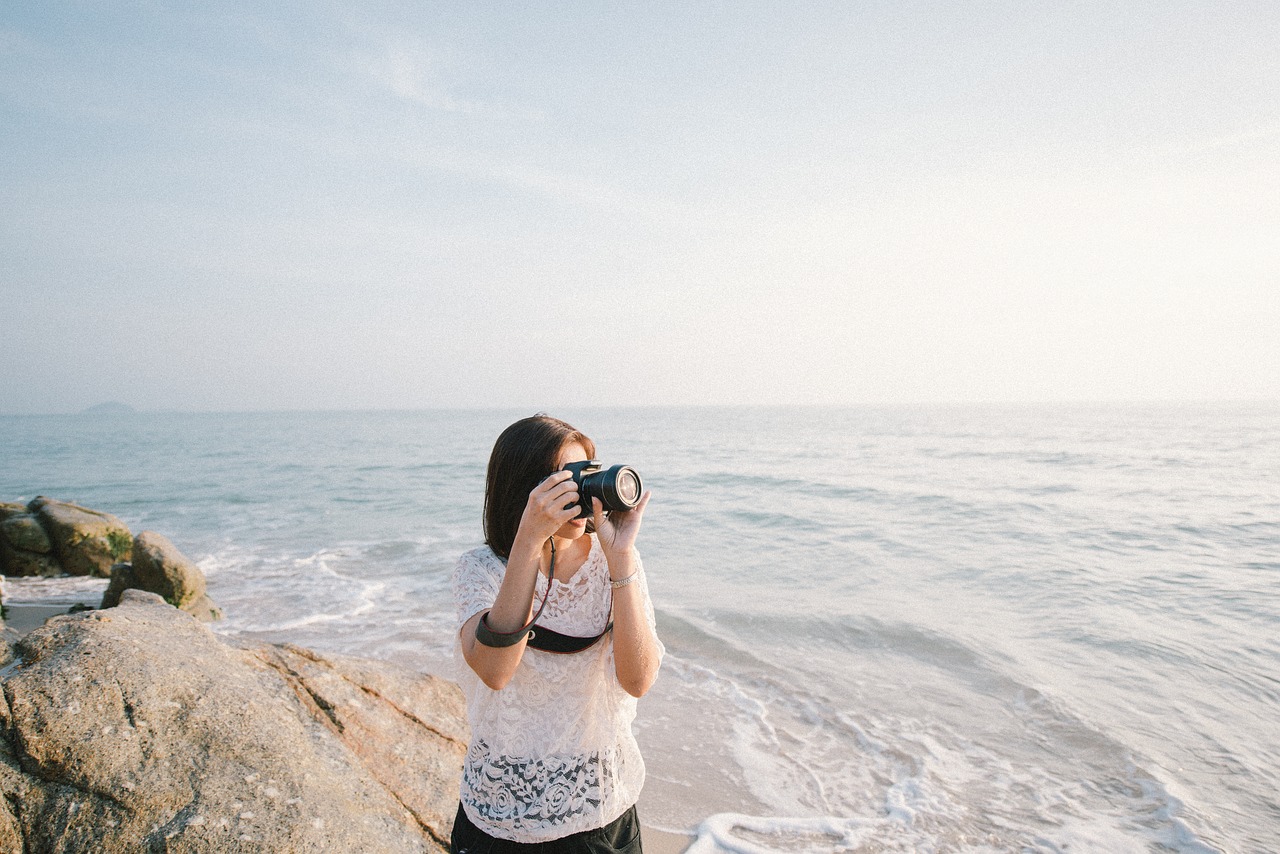 camera coast female free photo