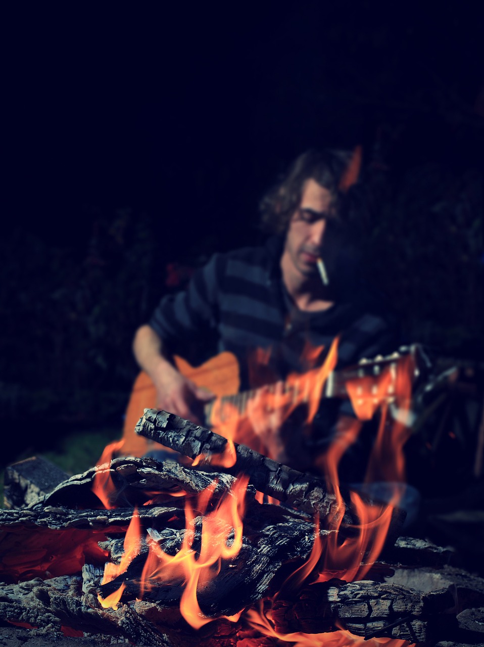 campfire man guitar free photo