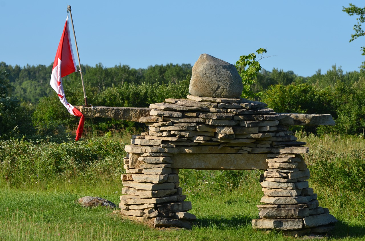 canada inukshuk stone free photo