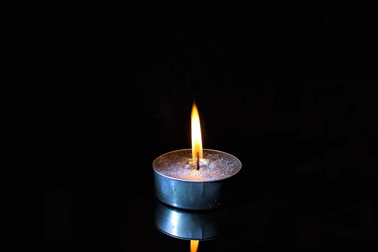 candle lighted candle flame free photo