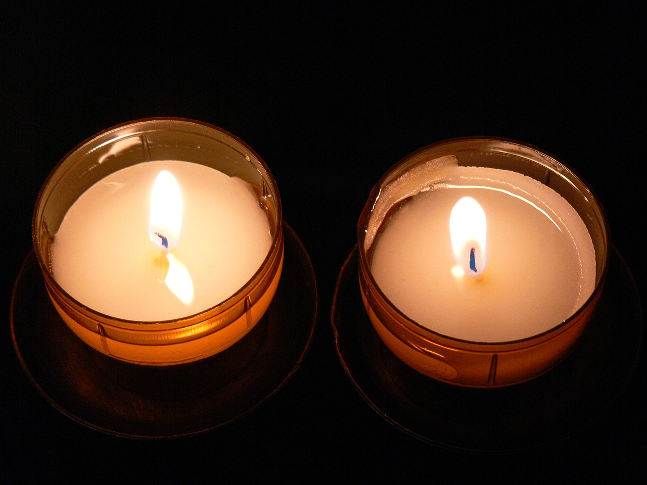 candle  votive light  religion free photo