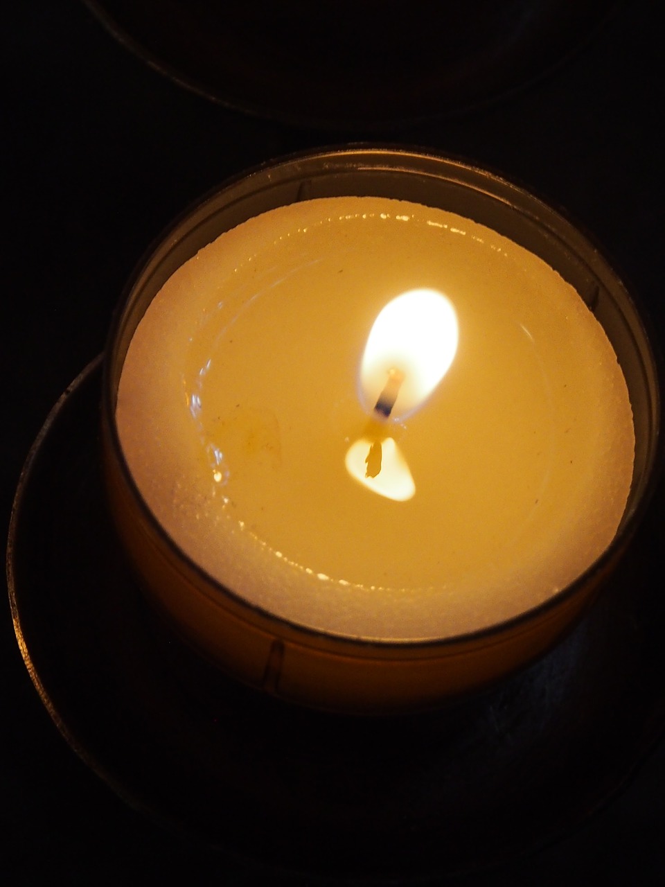 candle  votive light  religion free photo