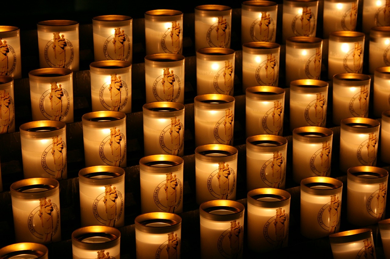 Download free photo of Candles,lighted candles,notre dame de paris ...