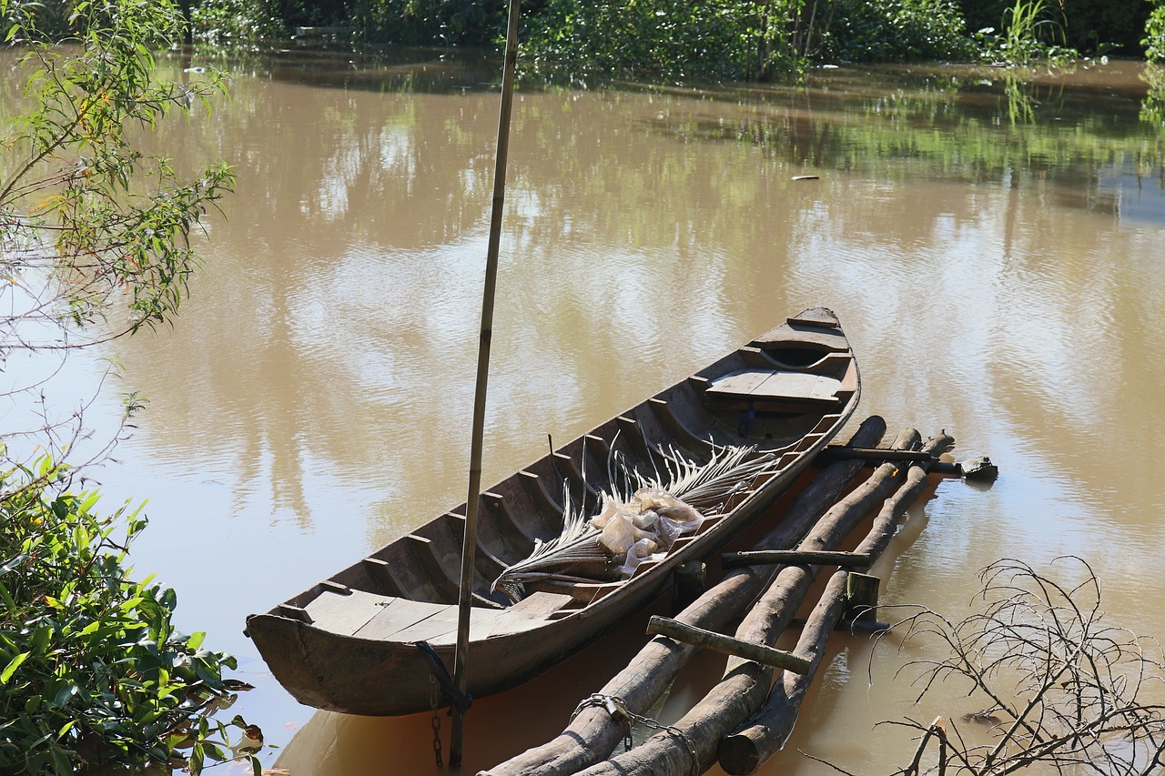 canoe vehicle flood water free photo