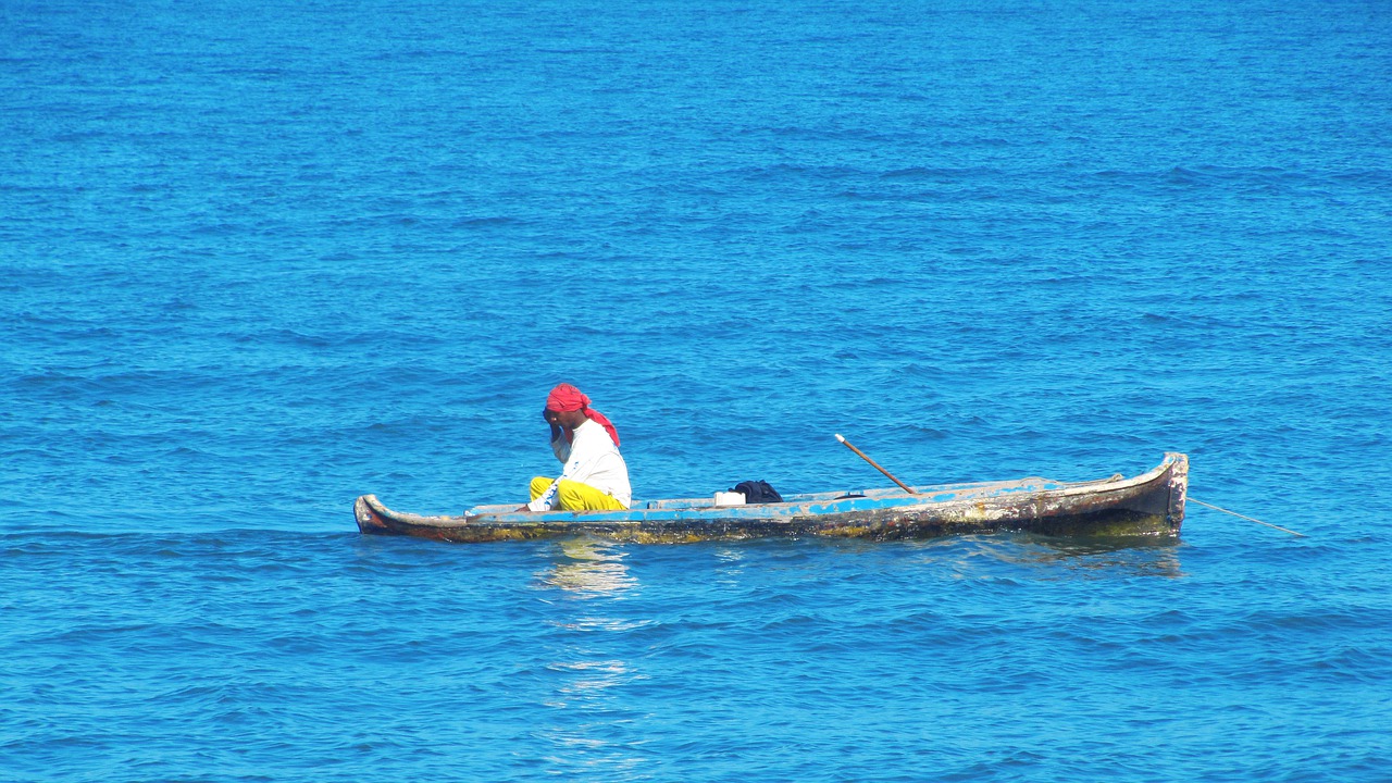 canoe  cartagena  fisherman free photo
