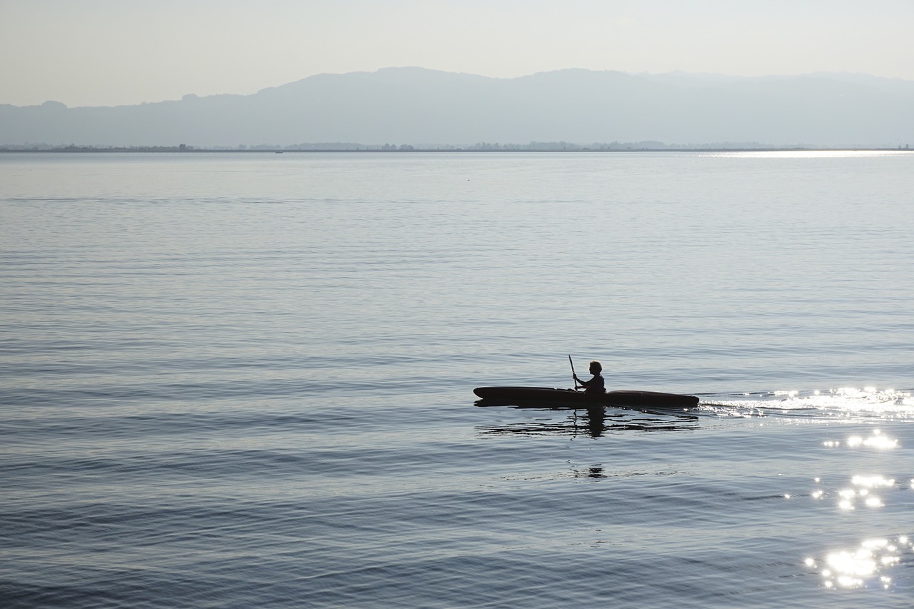 canoeing paddle lake free photo