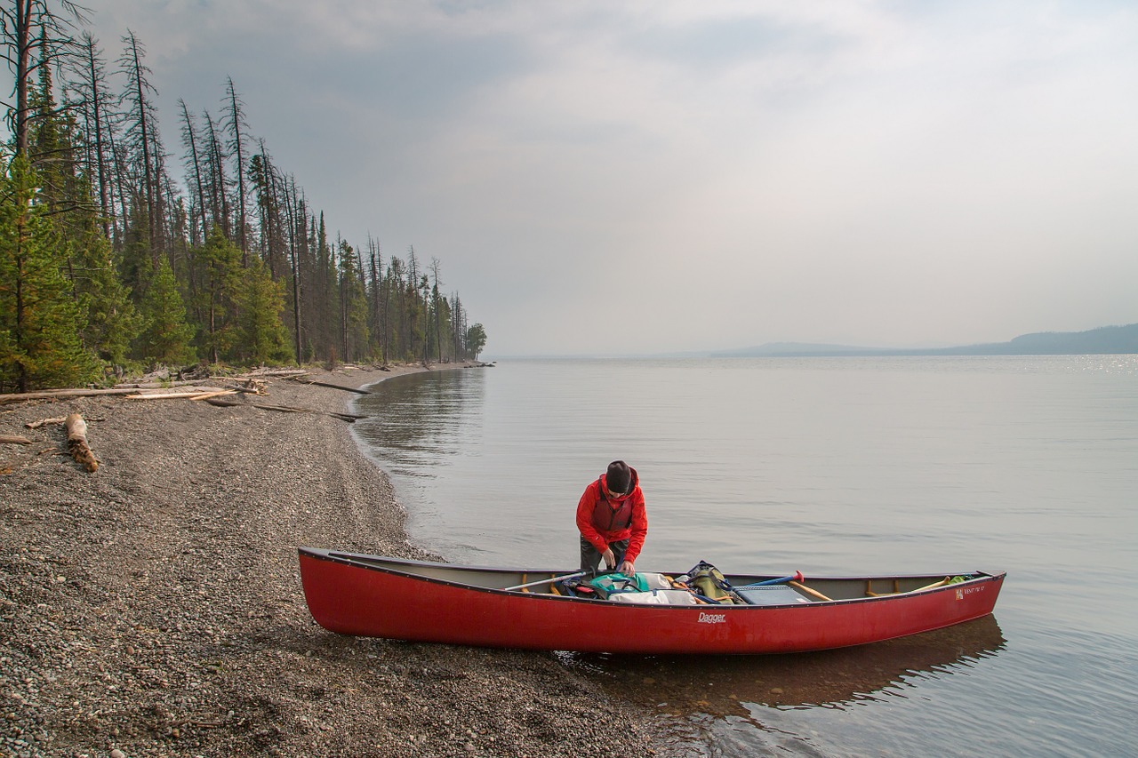 canoeist lake yellowstone free photo