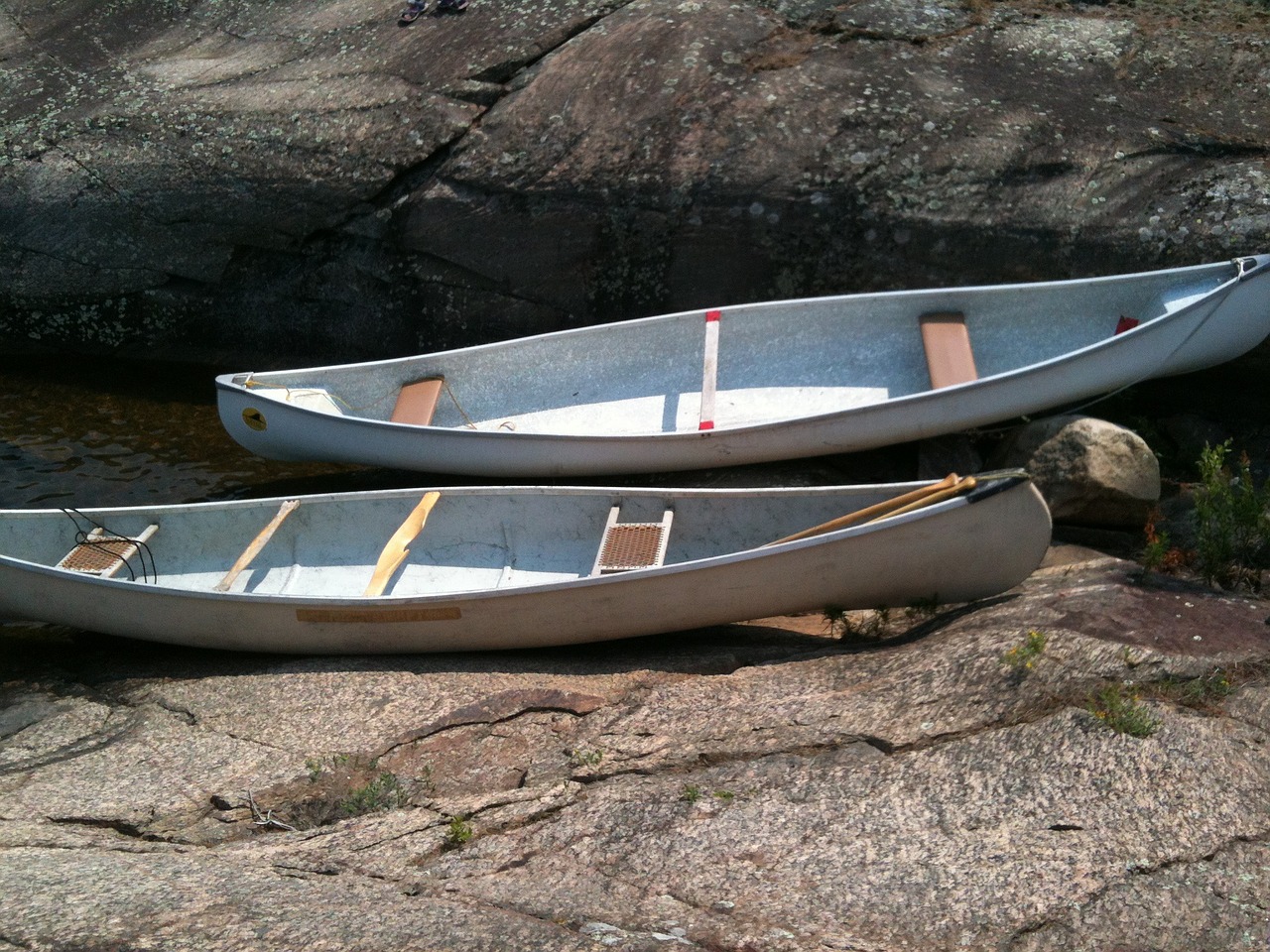 canoes shore lake free photo