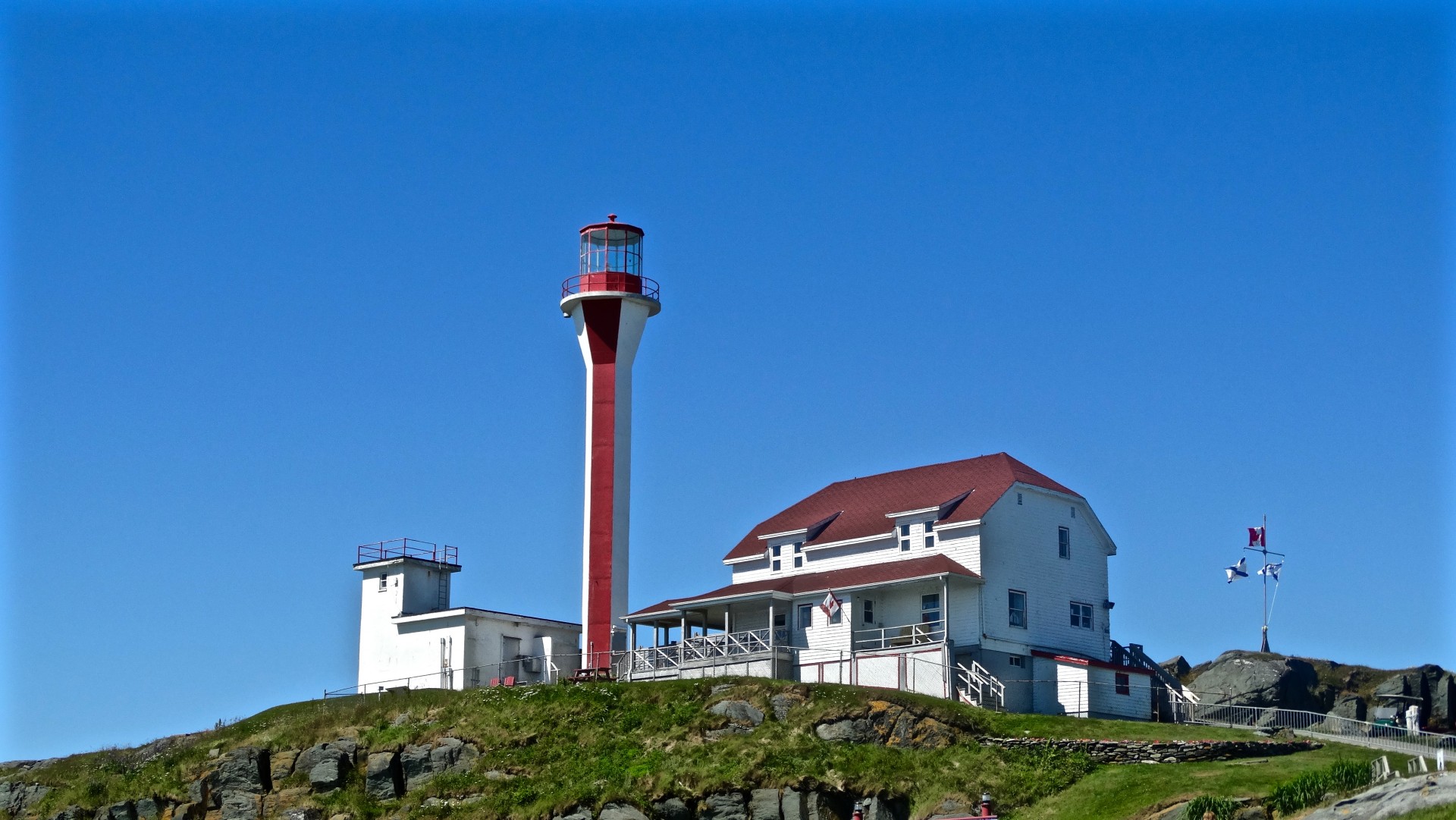 red white lighthouse free photo