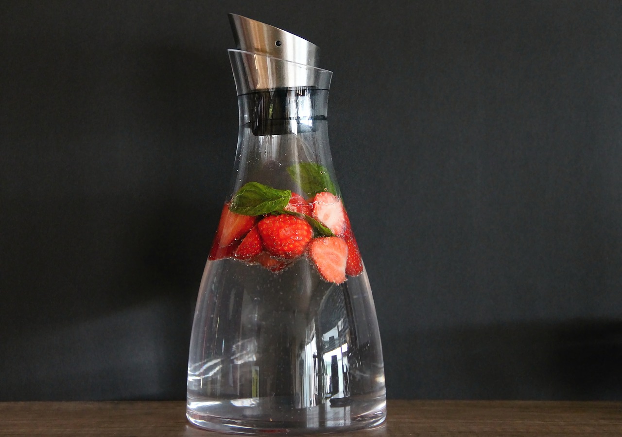 carafe  water  strawberries free photo