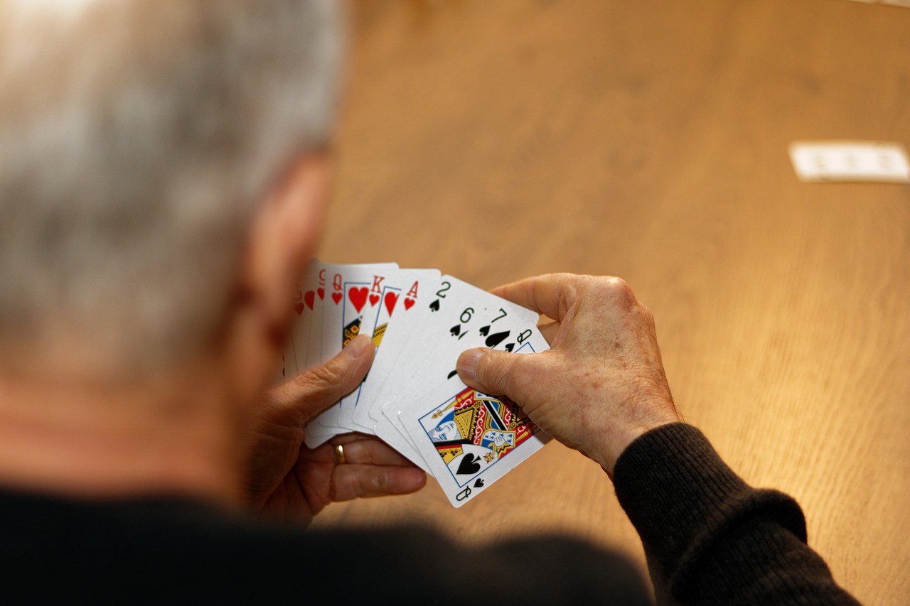 cards  old man  hand free photo