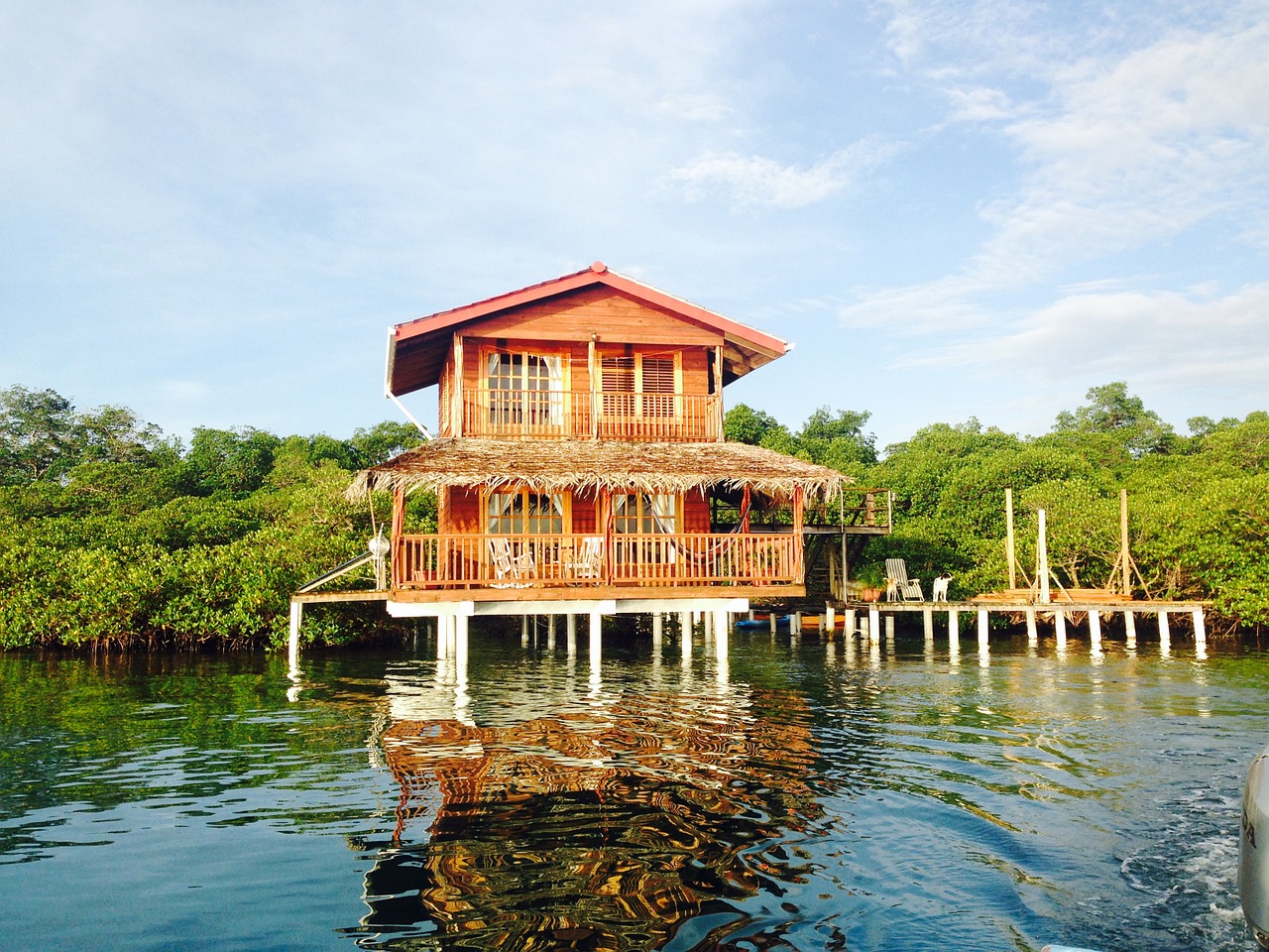 caribbean house on water house on stilts free photo