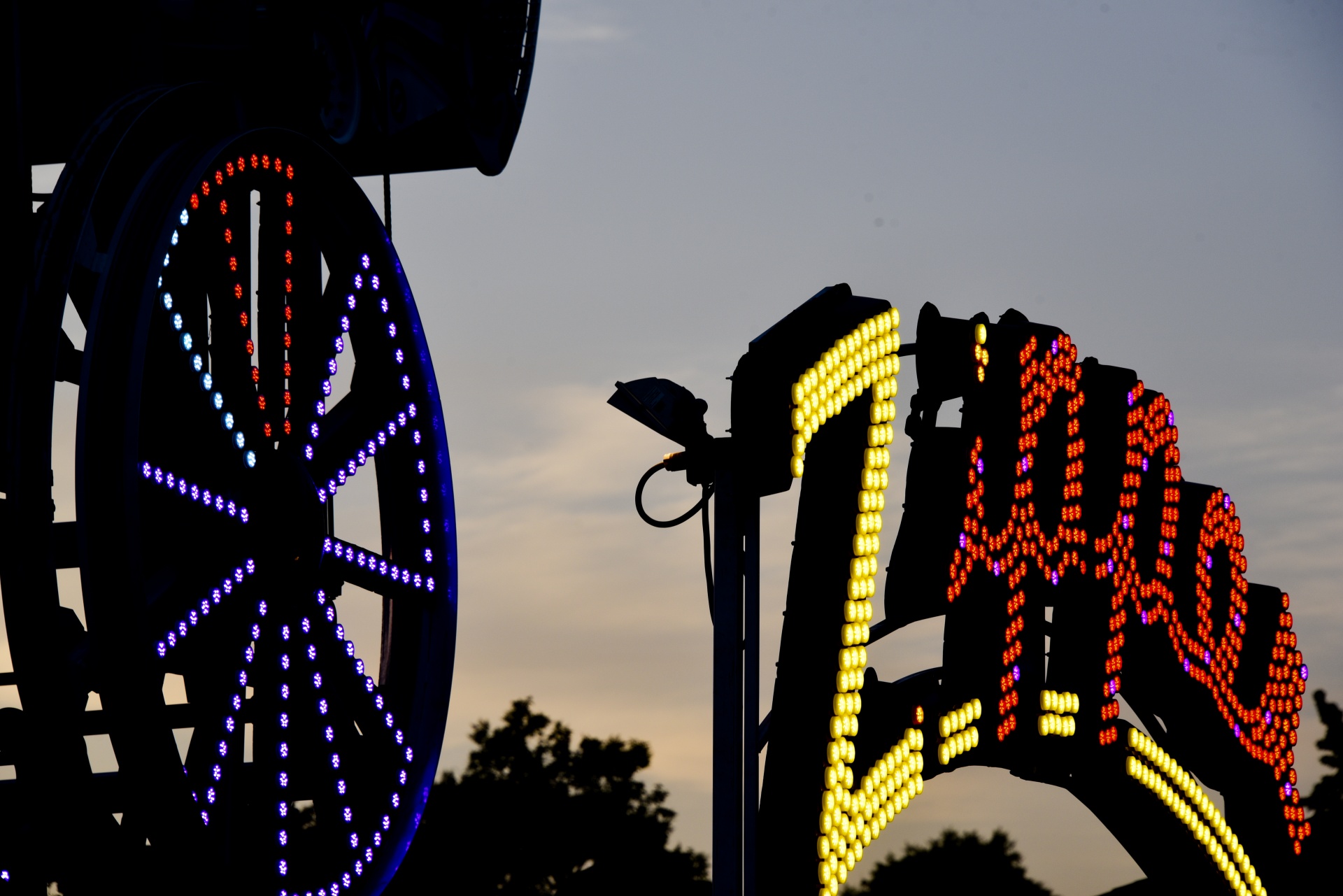 carnival rides dusk free photo