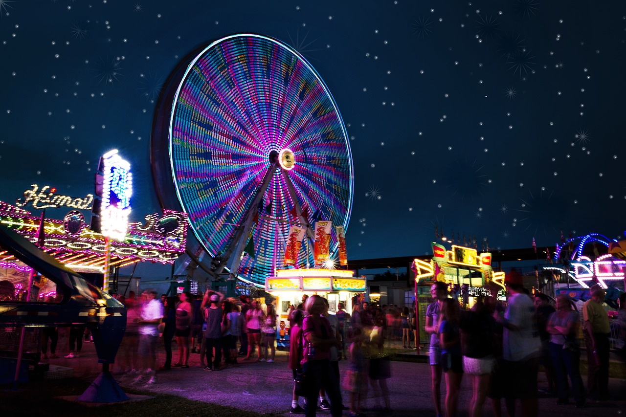 carnival rides night ferris wheel free photo