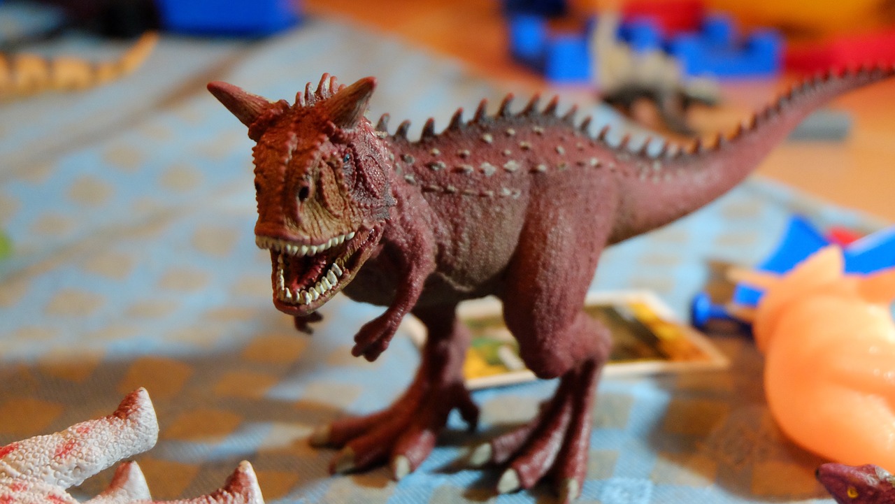 carnotauro dinosaur toy free photo