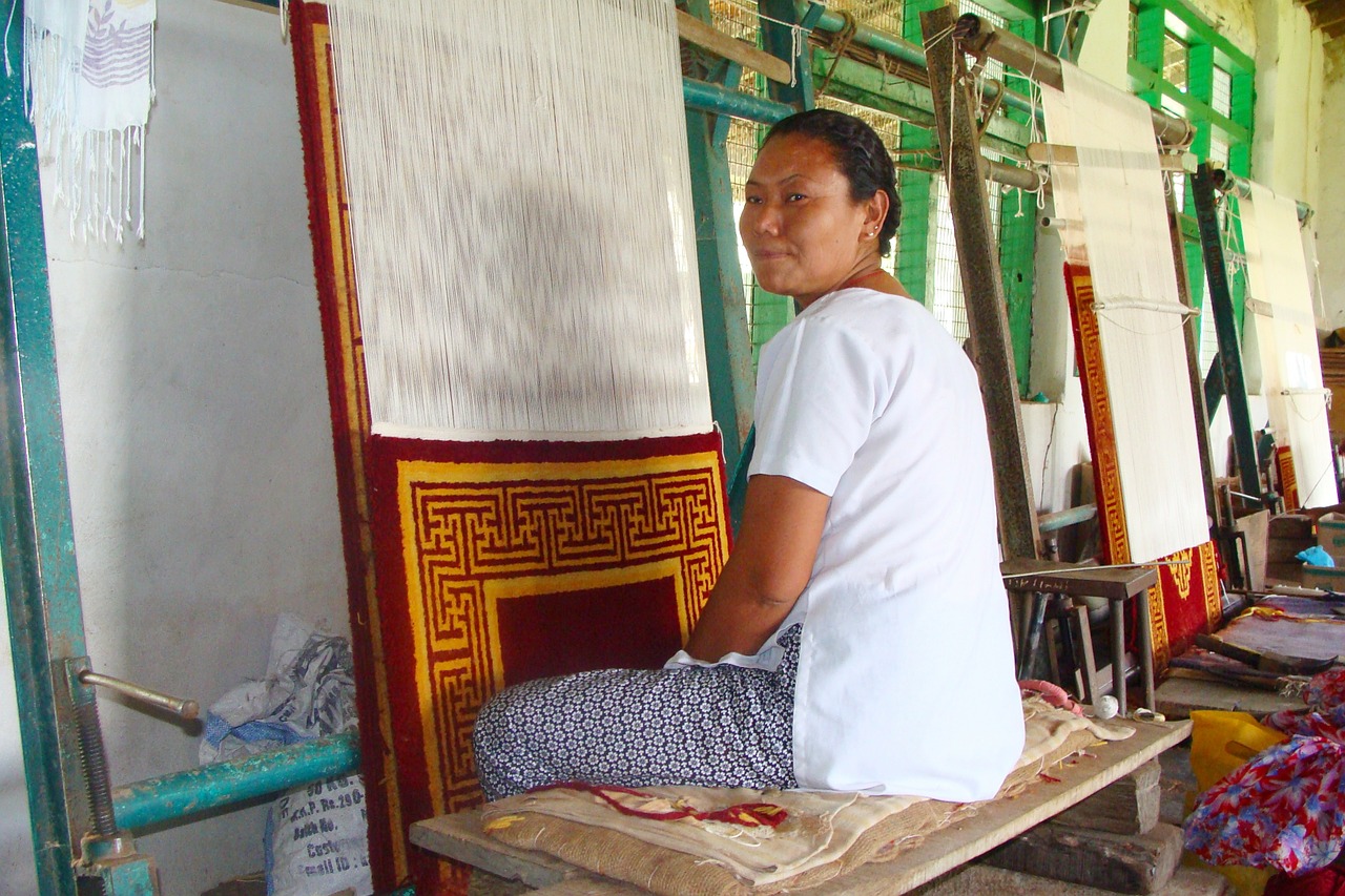 carpet weaving tibetan lady free photo