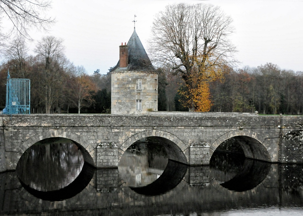 castle of sully-sur-loire bridge stone arch free photo
