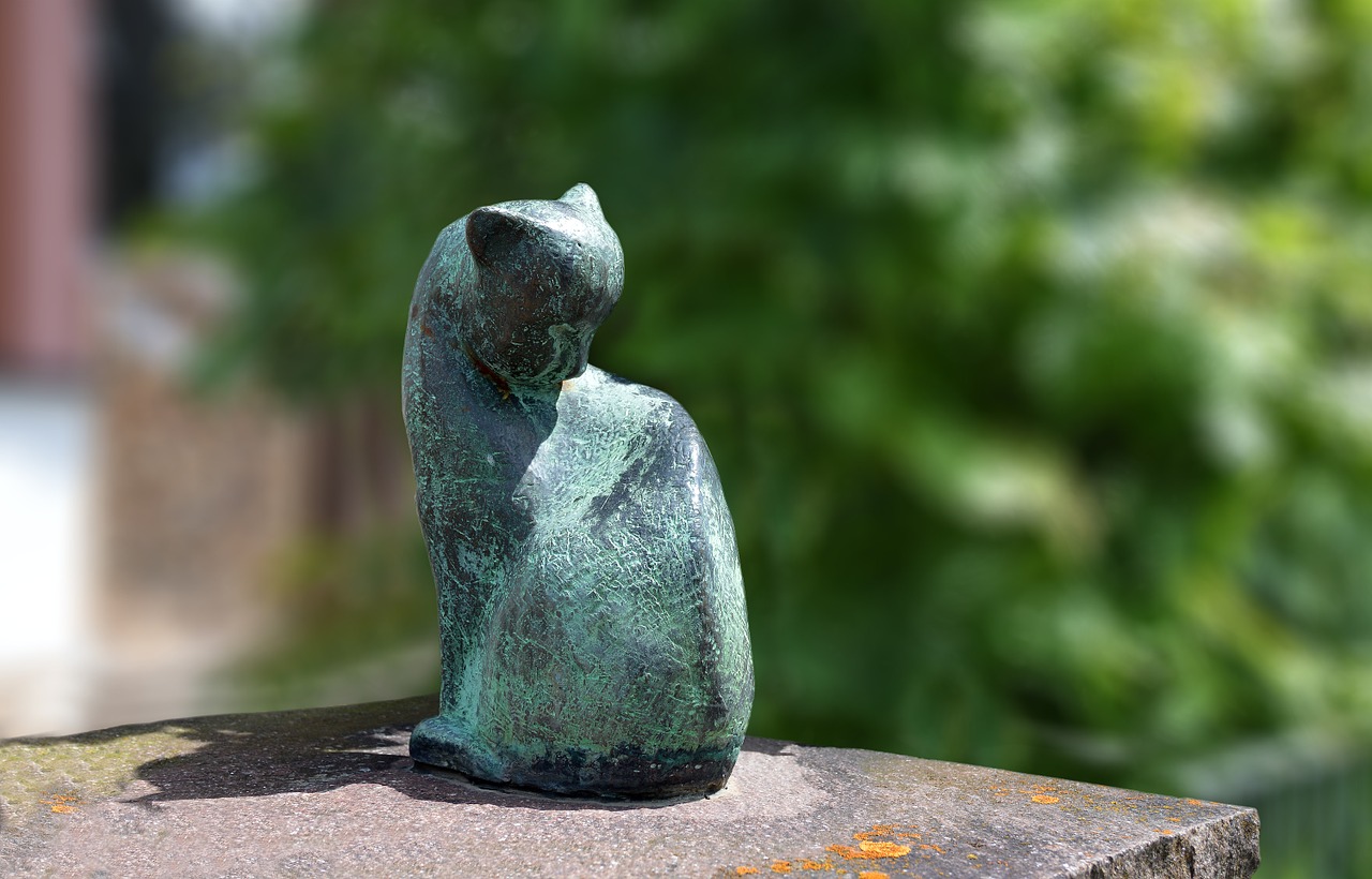 cat from stone sculpture figure free photo