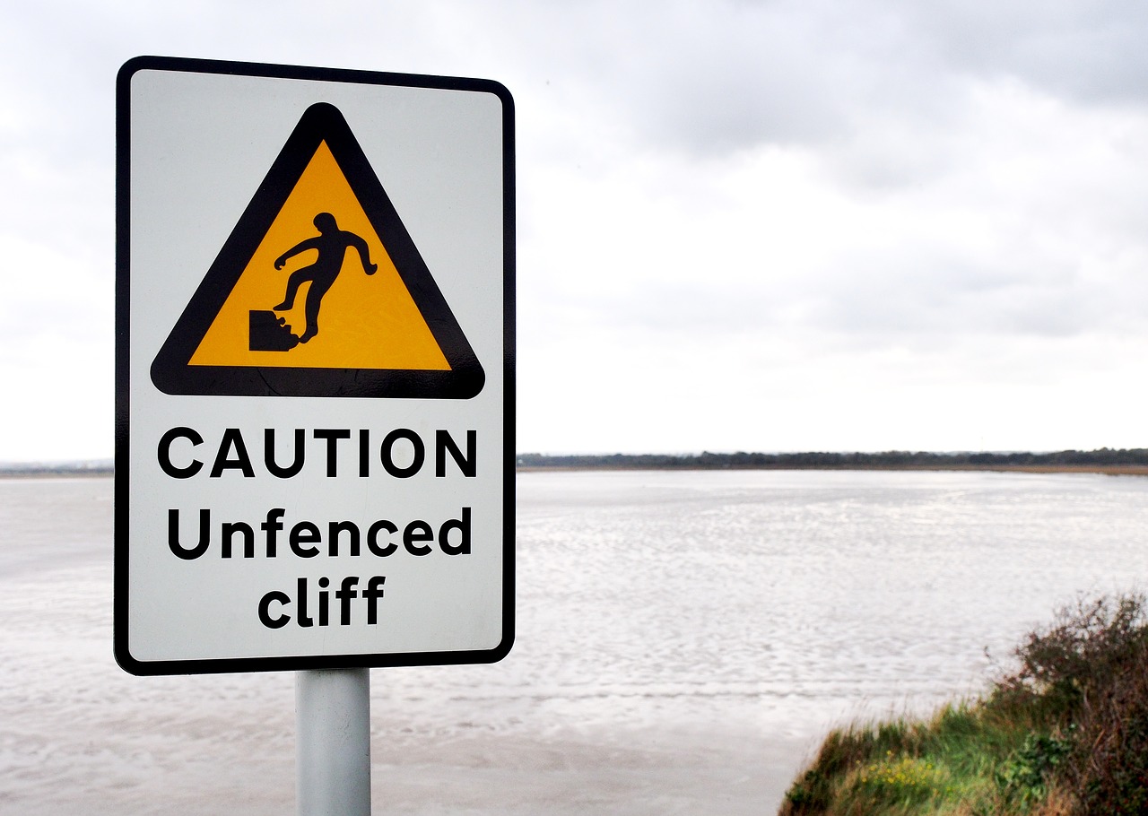 caution unfenced cliff free photo