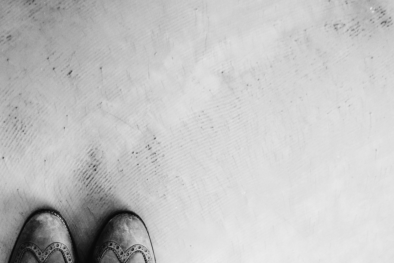 cement shoes black and white free photo