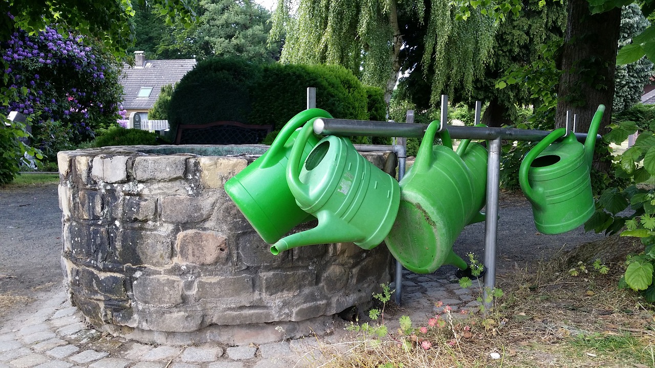 cemetery watering cans fountain free photo
