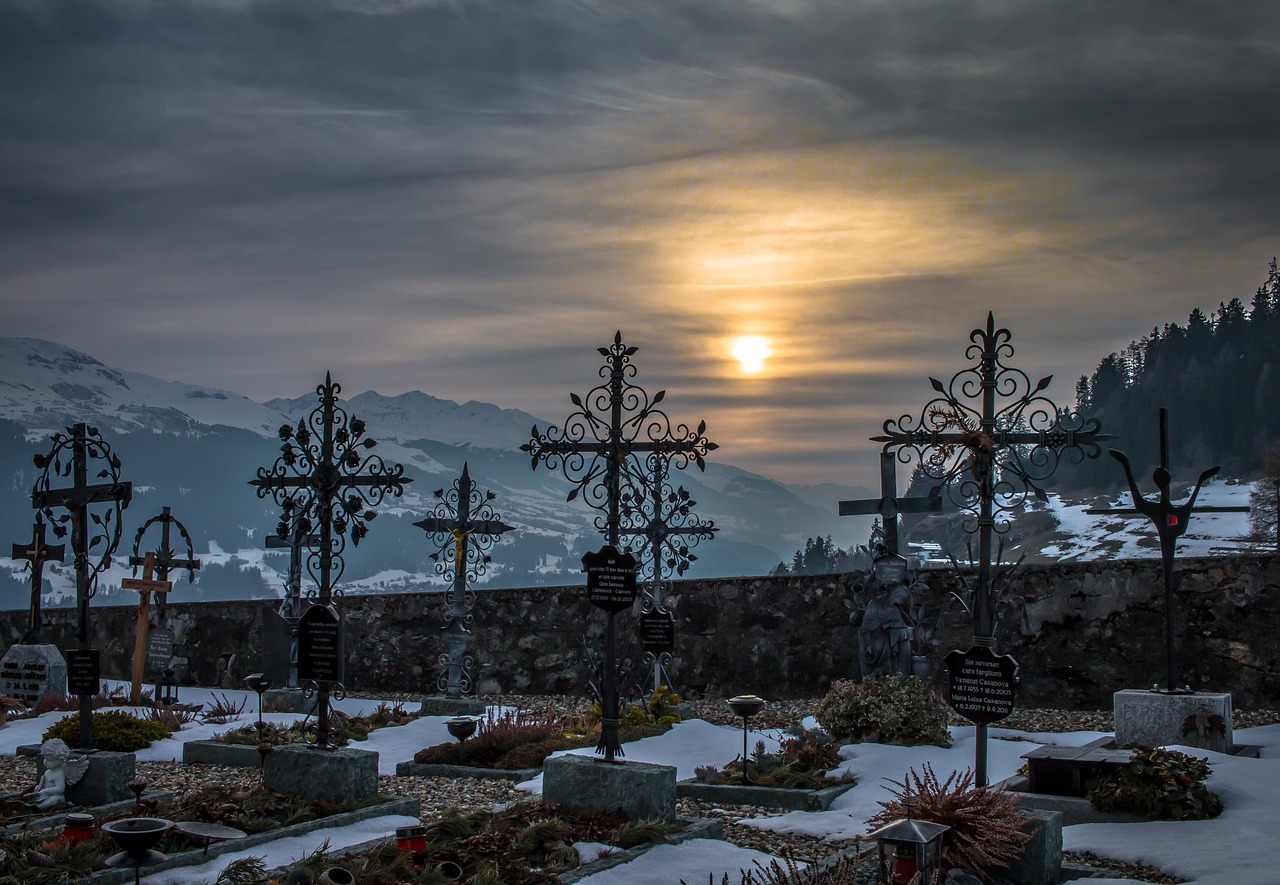 cemetery sunset snow free photo
