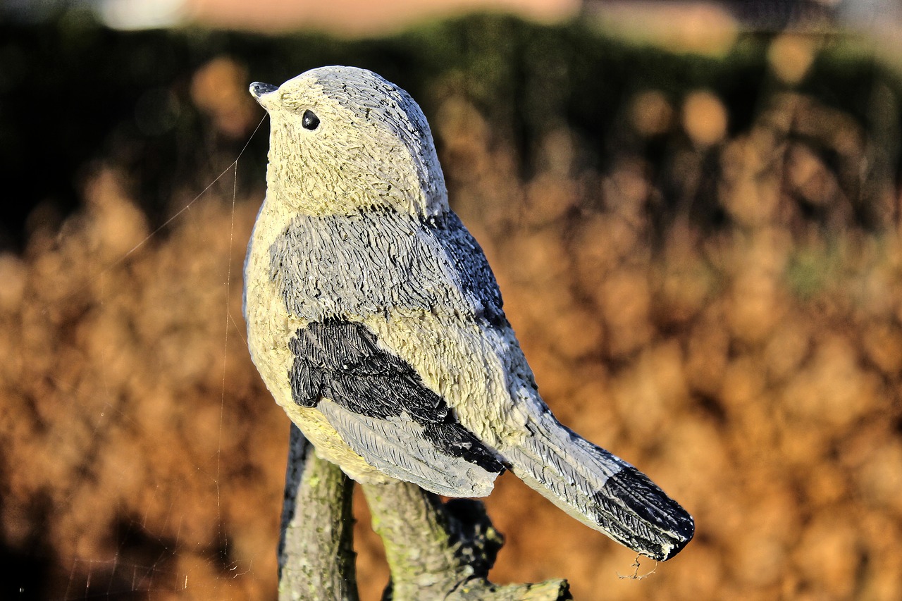 ceramic bird figure free photo