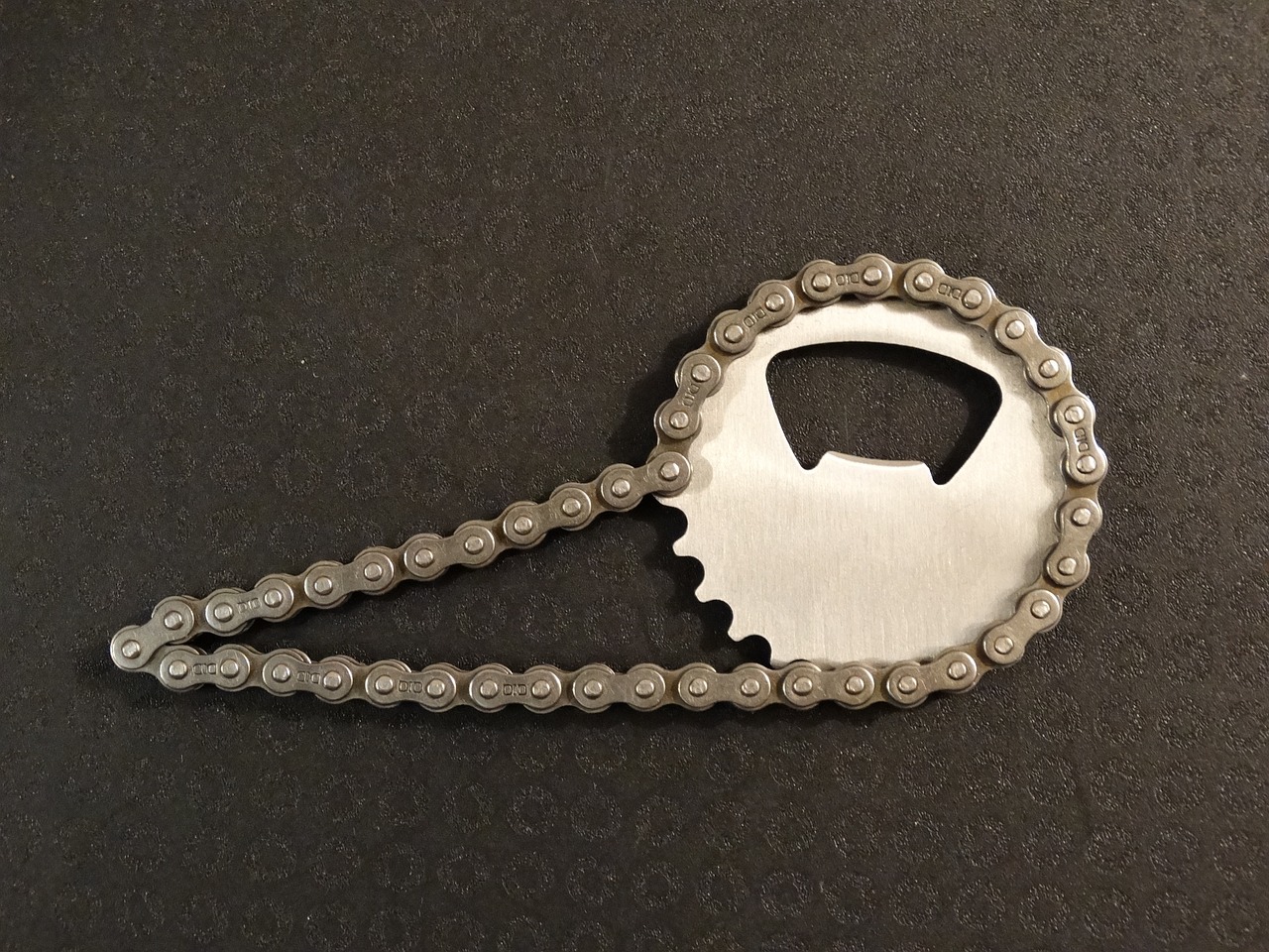 chain gear shape bottle opener free photo