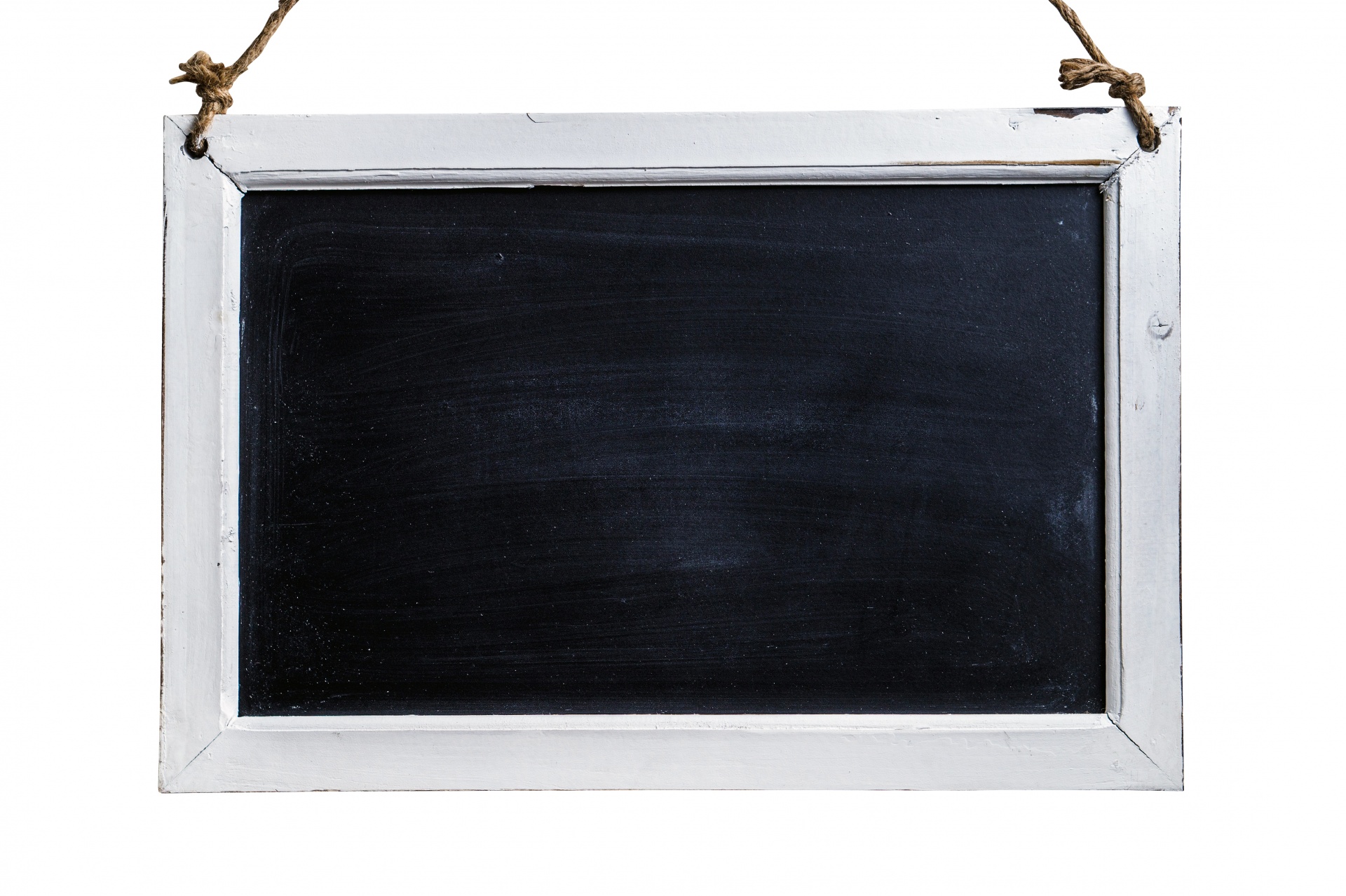 Black old empty chalkboard for copy space with colorful pieces of