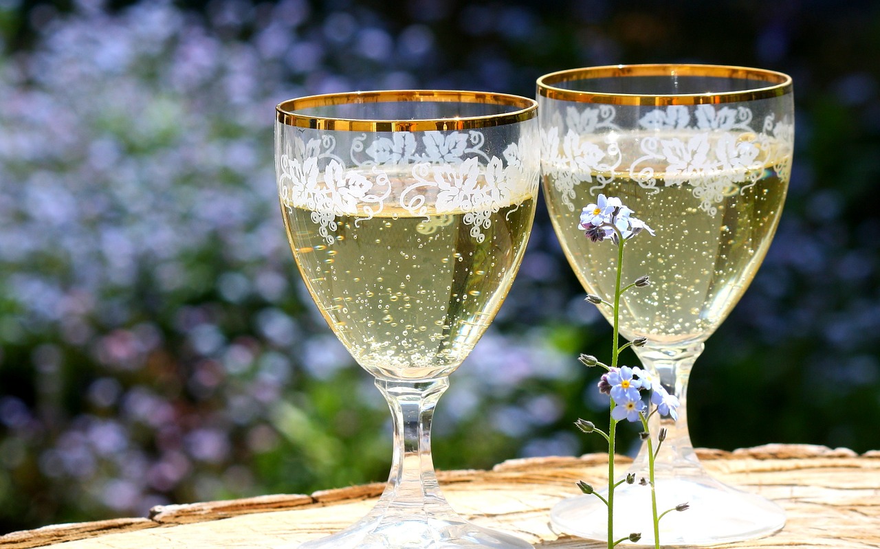 champagne glasses abut free photo