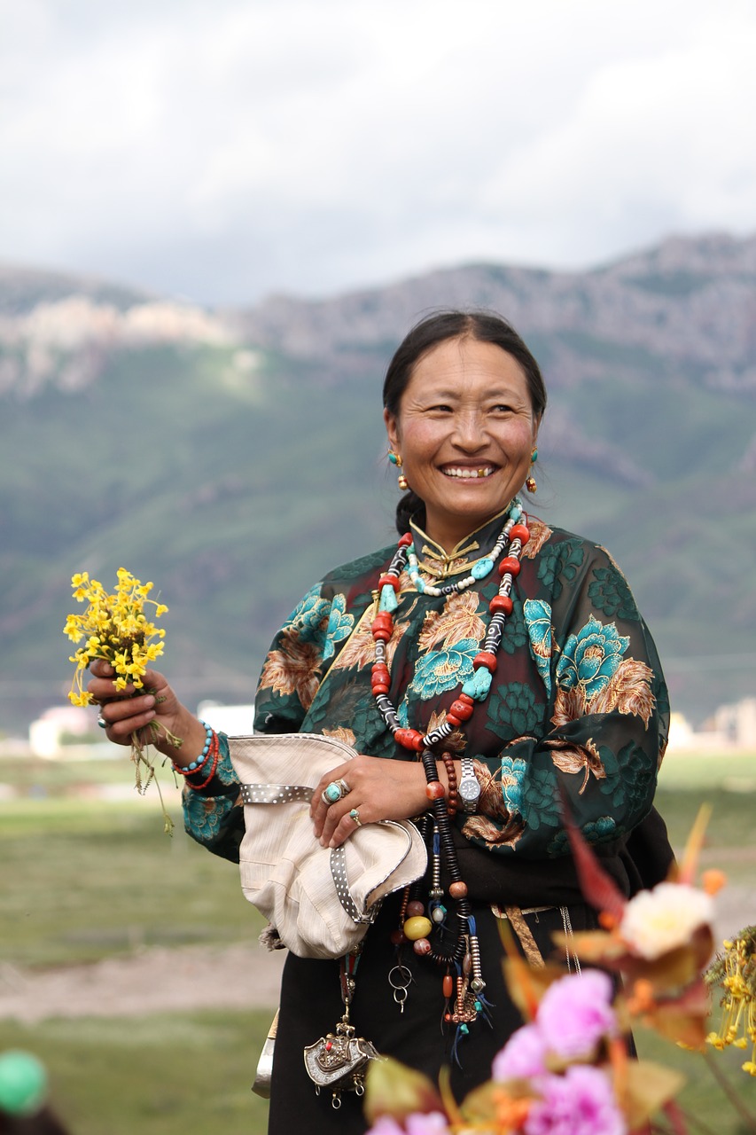 character tibet ethnic hand holding flowers free photo