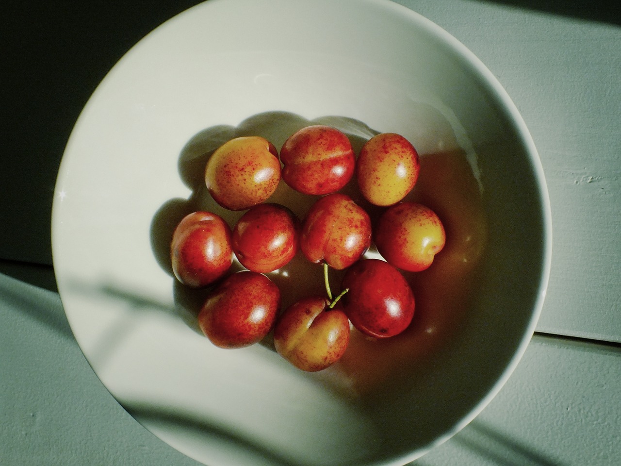 cherries cherry cherries on a plate free photo