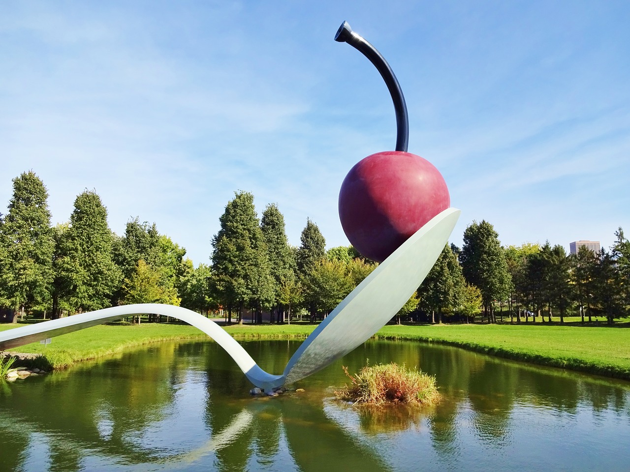 cherry on a spoon cherry sculpture free photo