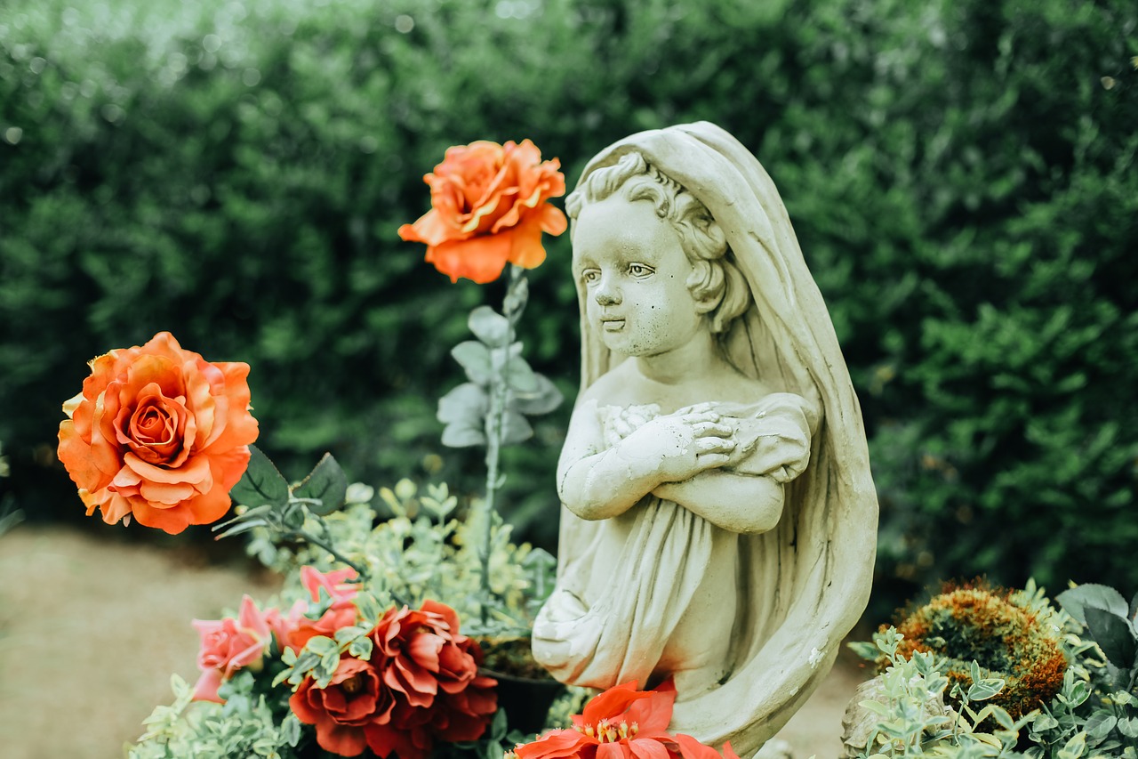 cherub  grave  flowers free photo