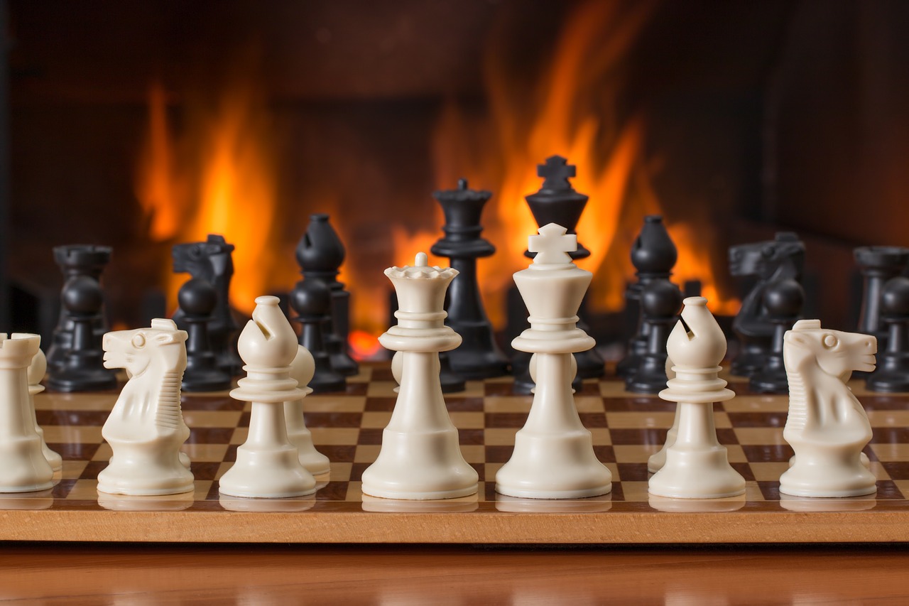 chess board game fireside free photo