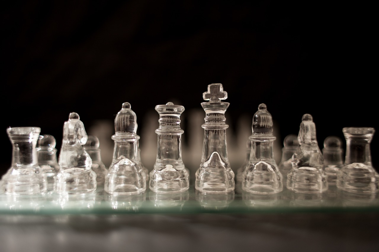 chess pieces glass chessboard free photo