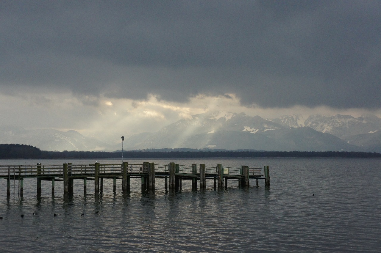 chiemsee mountains sun free photo