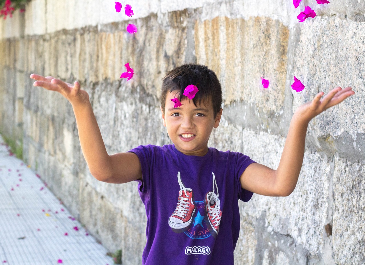 child petal flying free photo