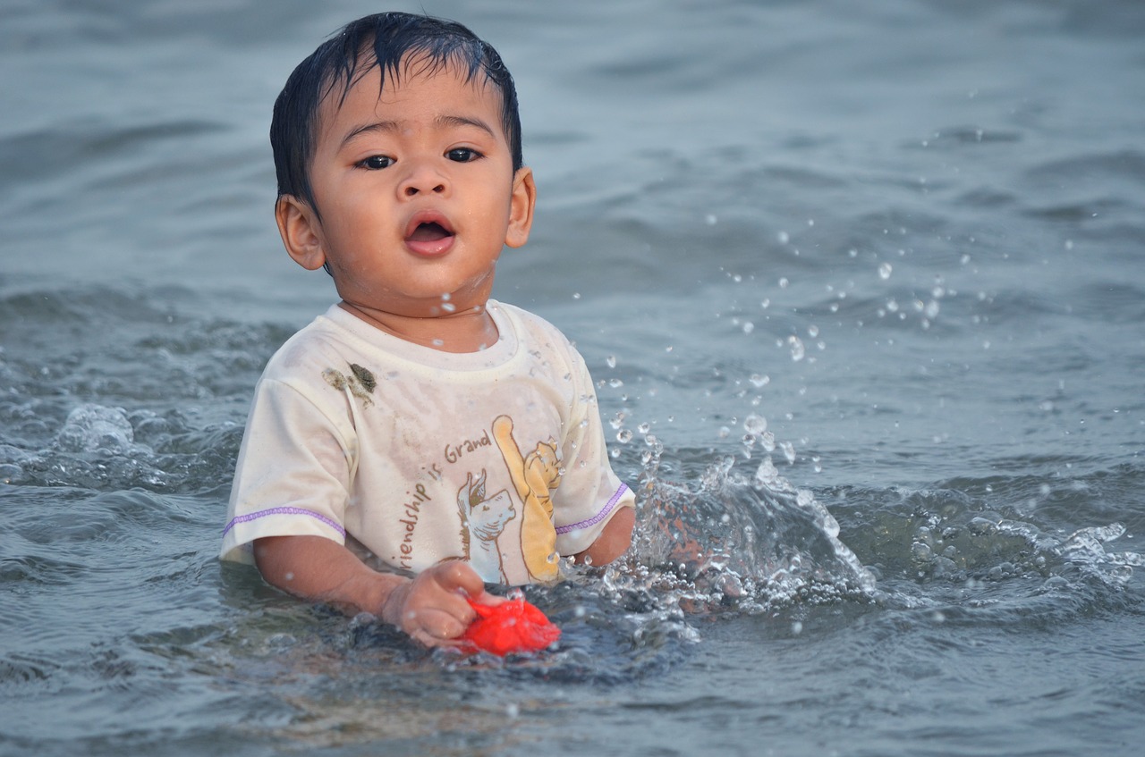 child water sea free photo