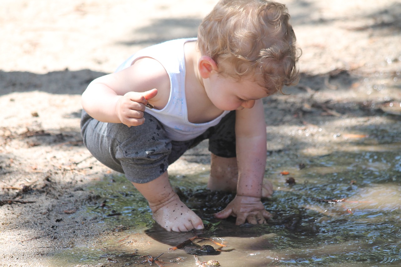 child mud puddle free photo