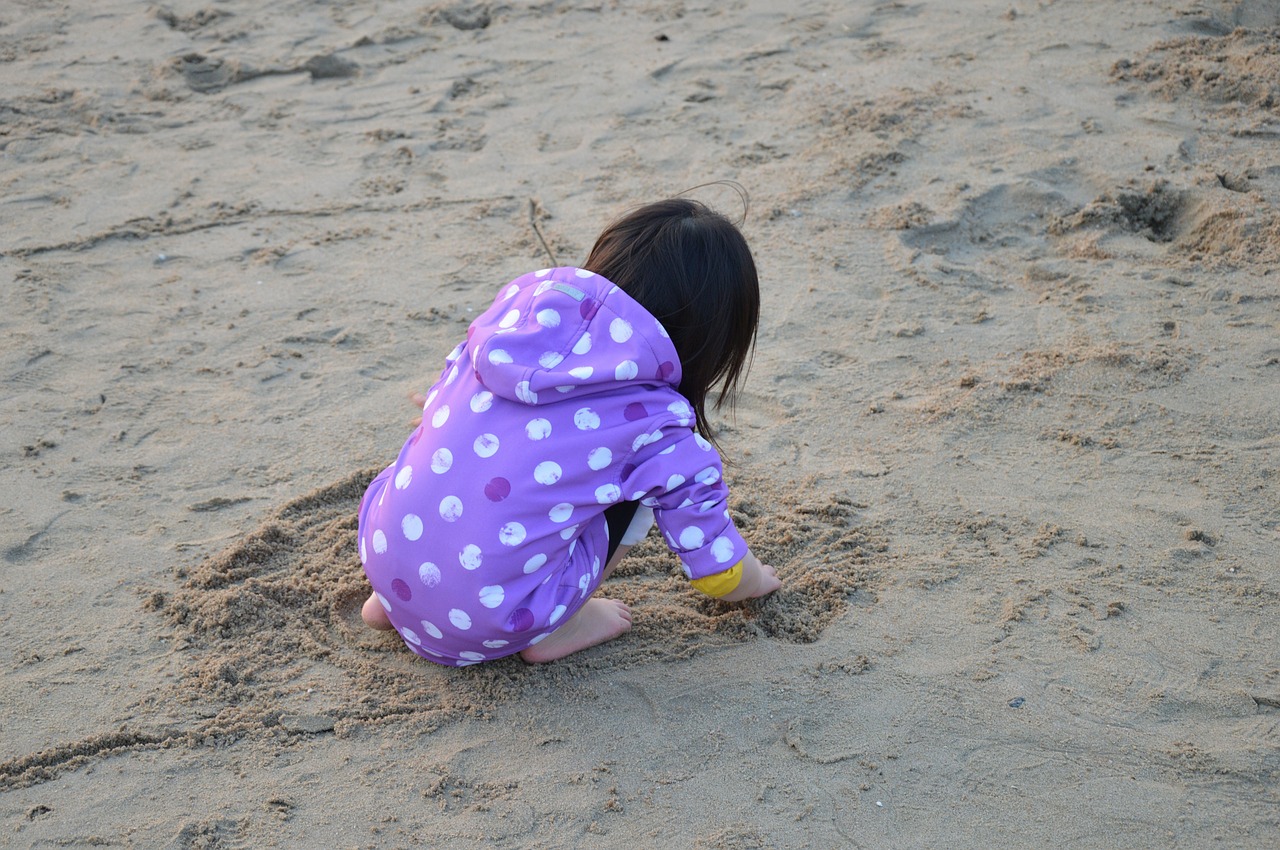 child playing sand free photo