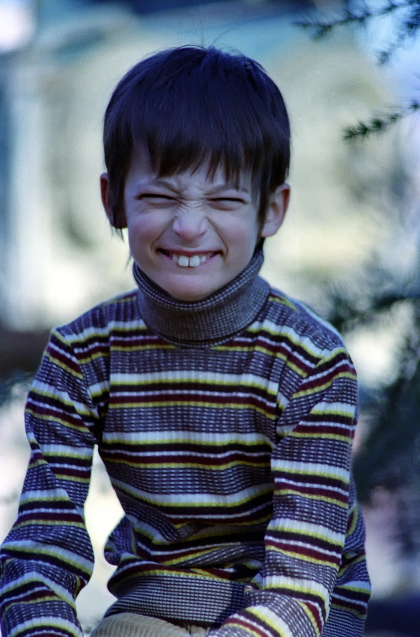 child  portrait  outdoors free photo