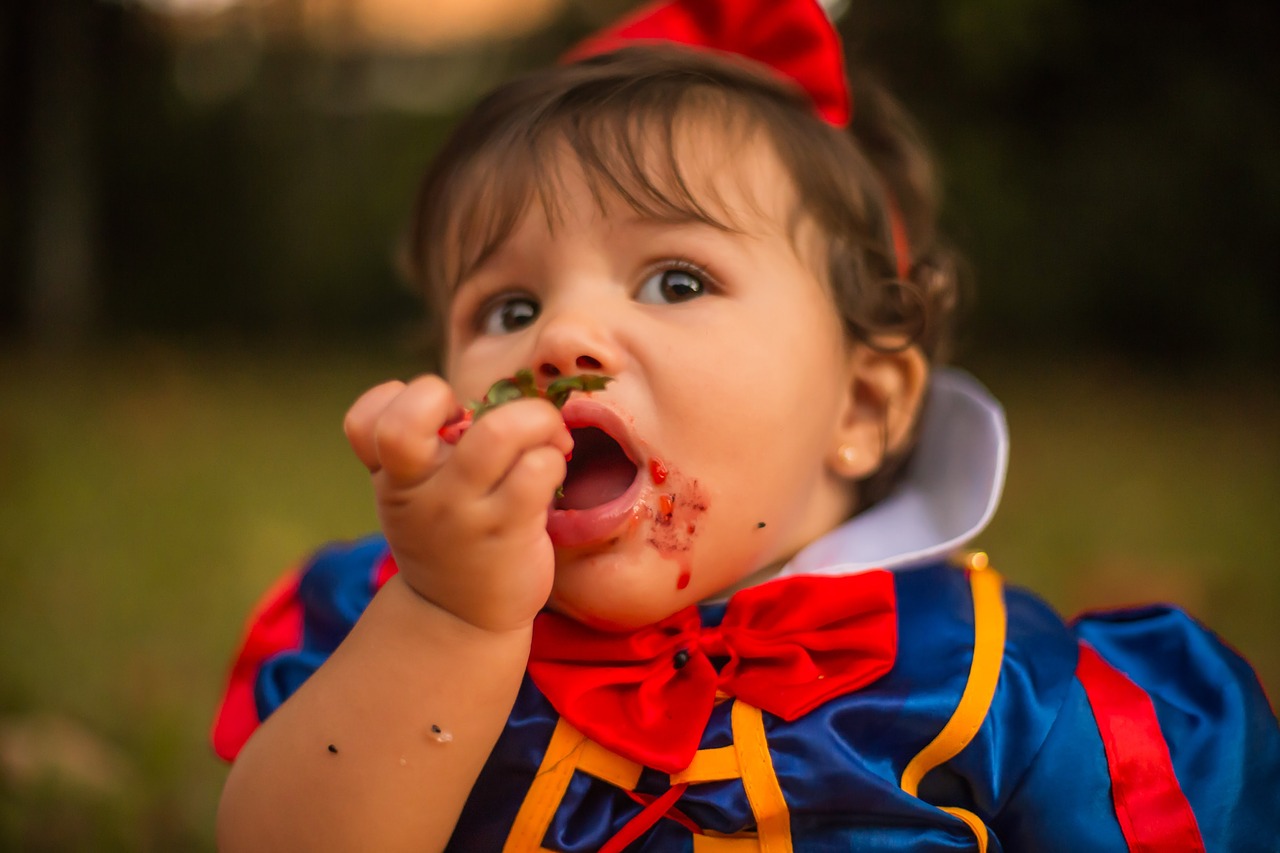 child  fruit  strawberry free photo