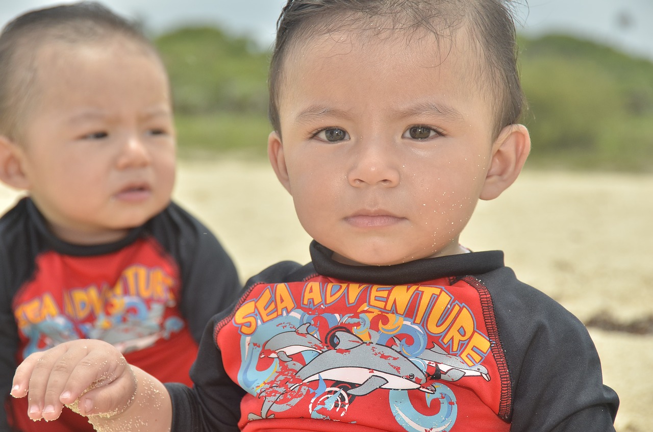 child  beach  twin free photo